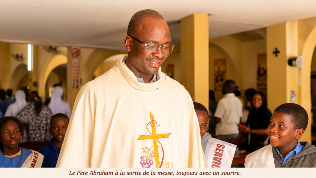L'Abbé Abraham FAYE, dont le sourire bienveillant reflète la joie de servir Dieu et la jeunesse.